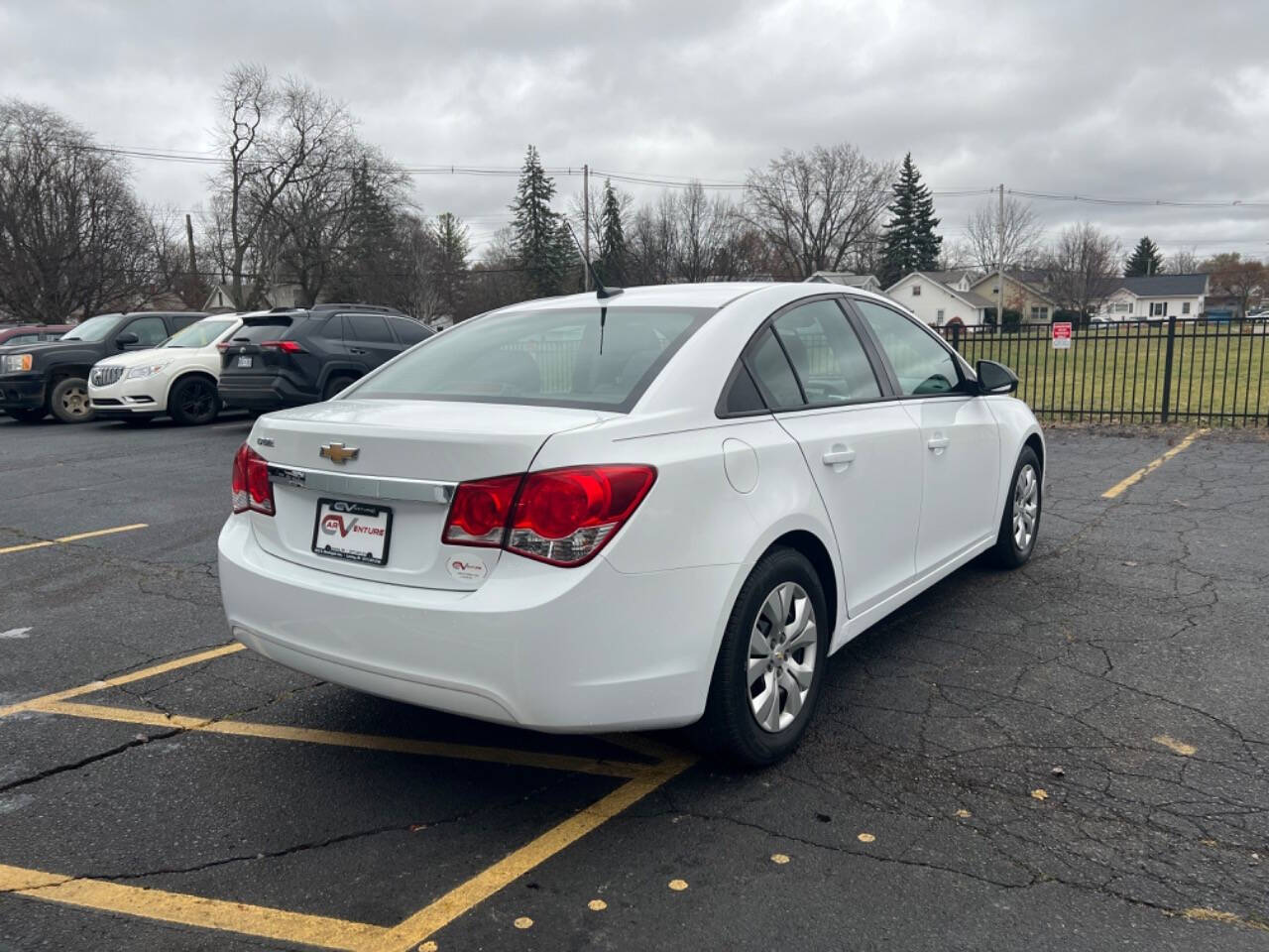 2014 Chevrolet Cruze for sale at Carventure in Lansing, MI