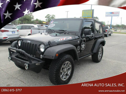 2015 Jeep Wrangler for sale at ARENA AUTO SALES,  INC. in Holly Hill FL