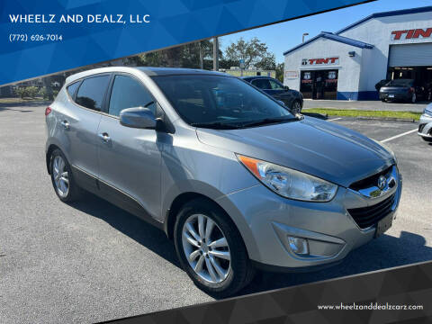 2012 Hyundai Tucson for sale at WHEELZ AND DEALZ, LLC in Fort Pierce FL