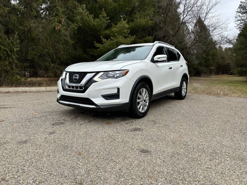 2019 Nissan Rogue for sale at Rombaugh's Auto Sales in Battle Creek MI