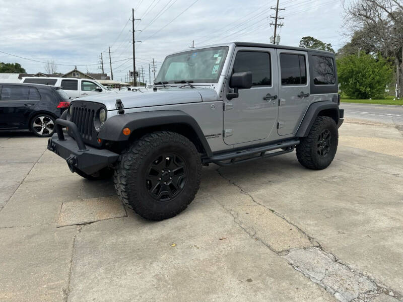 2013 Jeep Wrangler Unlimited for sale at Star Motorsports, LLC in Rayne LA