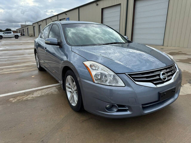 2012 Nissan Altima for sale at CAR MARKET AUTO GROUP in Sugar Land, TX