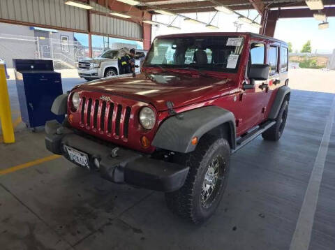 2011 Jeep Wrangler Unlimited for sale at Cars Unlimited OC in Orange CA