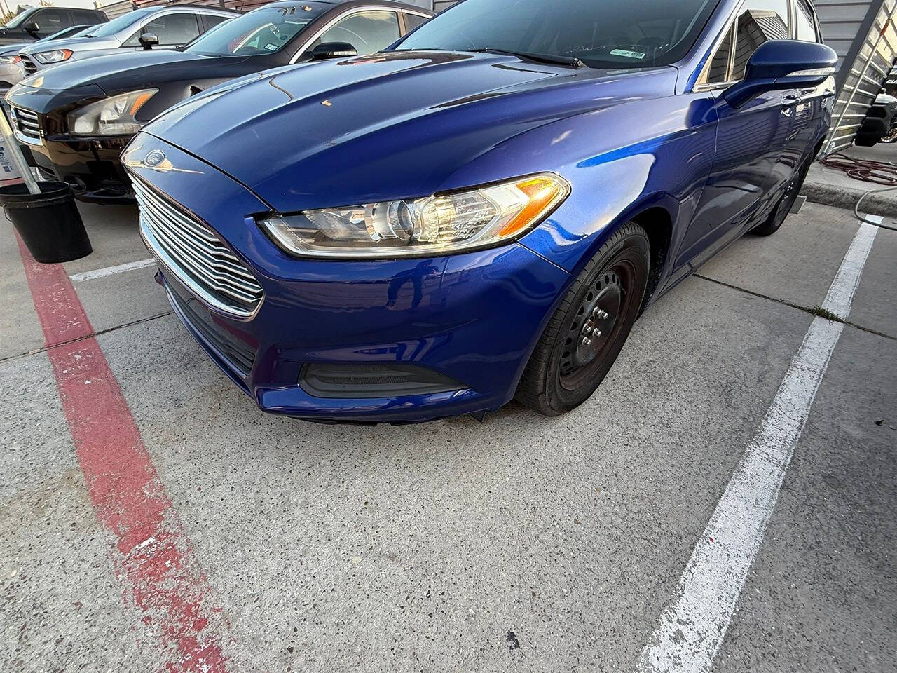 2014 Ford Fusion for sale at Chrome Auto in Houston, TX