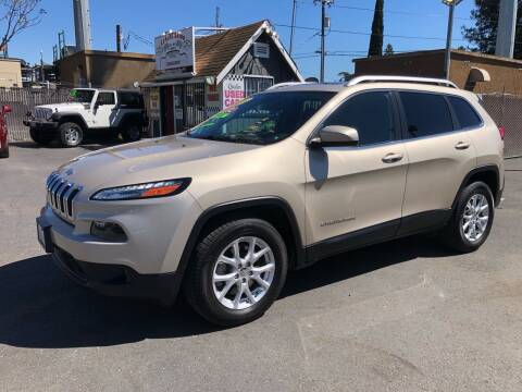 2014 Jeep Cherokee for sale at C J Auto Sales in Riverbank CA