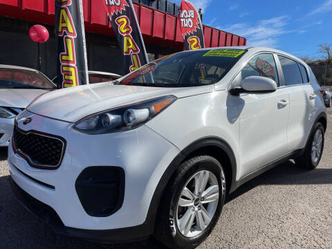 2019 Kia Sportage for sale at Duke City Auto LLC in Gallup NM