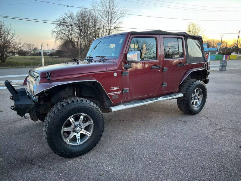 2010 Jeep Wrangler Unlimited for sale at Glizzy Auto Sales in Barberton OH