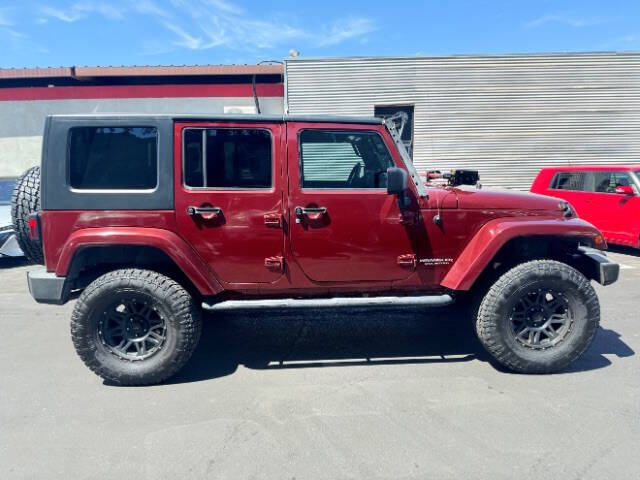 Used 2007 Jeep Wrangler Unlimited Sahara with VIN 1J4GB591X7L125043 for sale in Mesa, AZ