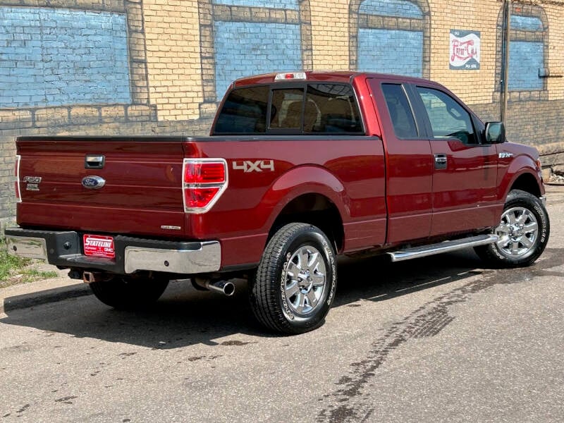 Used 2014 Ford F-150 XLT with VIN 1FTFX1EF7EKD24003 for sale in Iron River, MI