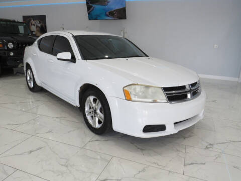 2012 Dodge Avenger for sale at Dealer One Auto Credit in Oklahoma City OK