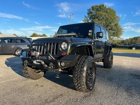 2012 Jeep Wrangler Unlimited for sale at CarWorx LLC in Dunn NC