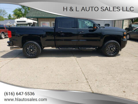2018 Chevrolet Silverado 2500HD for sale at H & L AUTO SALES LLC in Wyoming MI