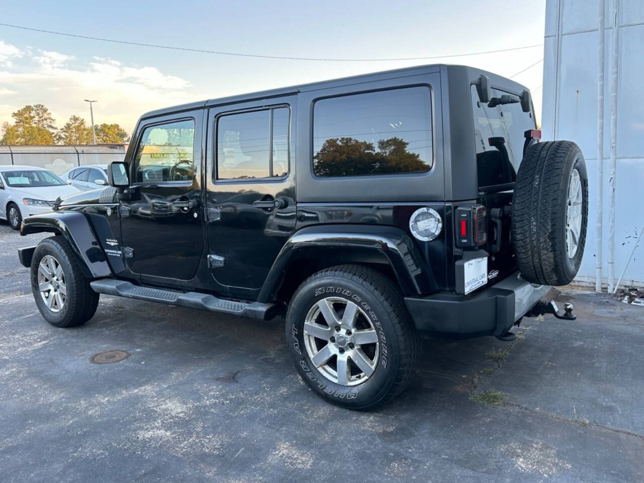 2013 Jeep Wrangler Unlimited for sale at Prompt Luxury Cars LLC in Austell, GA