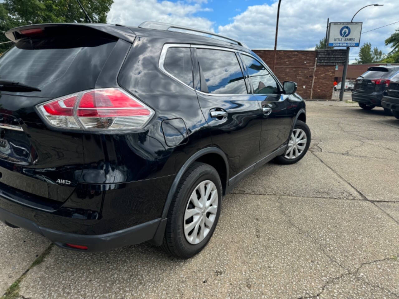 2015 Nissan Rogue for sale at First Class Auto Mall in Akron, OH