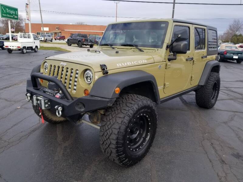 2013 Jeep Wrangler Unlimited for sale at Larry Schaaf Auto Sales in Saint Marys OH
