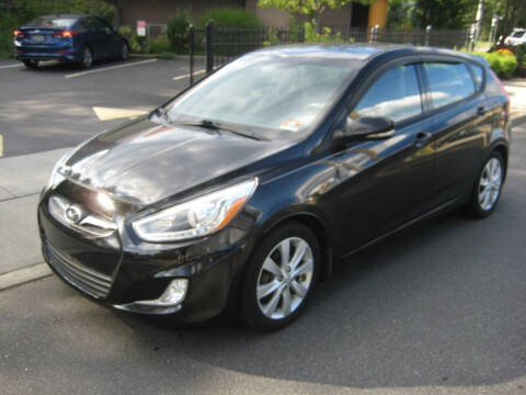 2014 Hyundai Accent for sale at Top Choice Auto Inc in Massapequa Park NY
