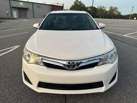 2013 Toyota Camry for sale at Phoenix Motor Sales in Snellville GA