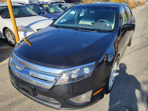 2011 Ford Fusion for sale at Howe's Auto Sales in Lowell MA