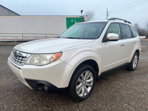2012 Subaru Forester for sale at The Car Mart in Milford IN