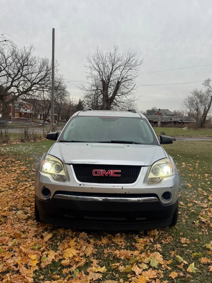 2011 GMC Acadia for sale at H & H AUTO GROUP in Detroit, MI