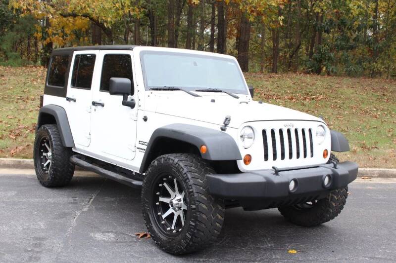 2013 Jeep Wrangler Unlimited for sale at El Patron Trucks in Norcross GA