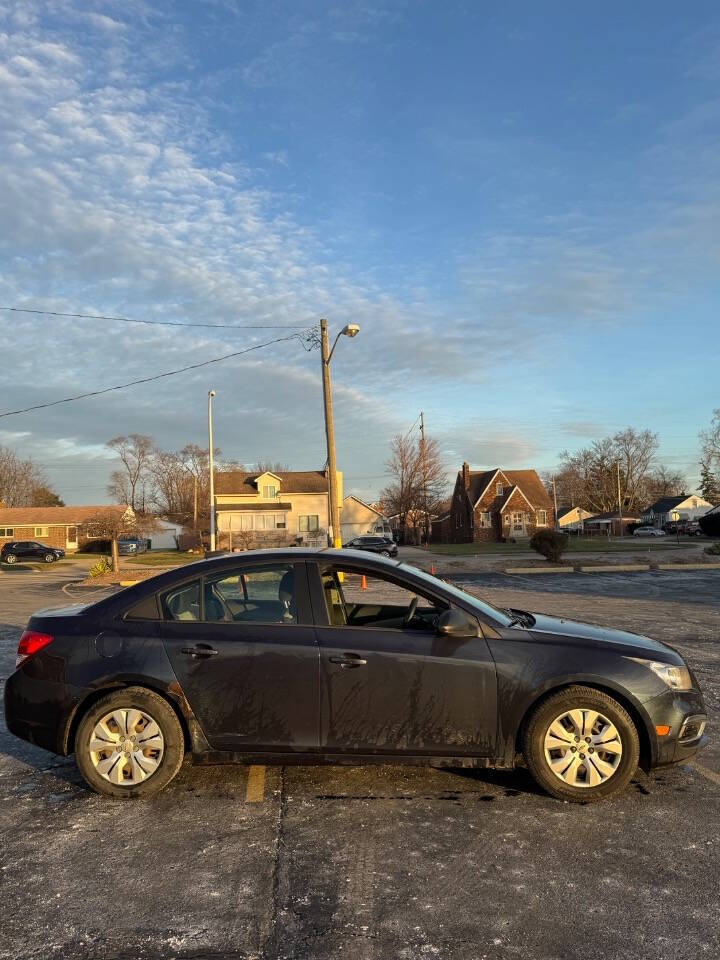 2015 Chevrolet Cruze for sale at H & H AUTO GROUP in Detroit, MI