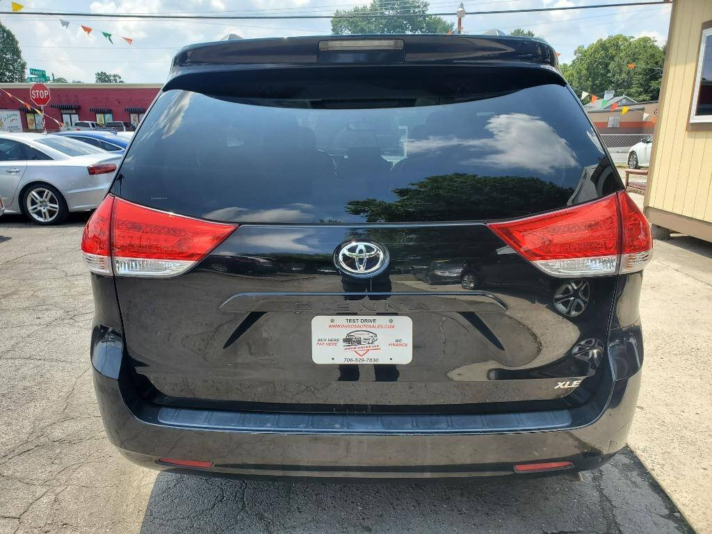 2013 Toyota Sienna for sale at DAGO'S AUTO SALES LLC in Dalton, GA