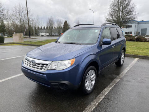 2011 Subaru Forester for sale at AFFORD-IT AUTO SALES LLC in Tacoma WA