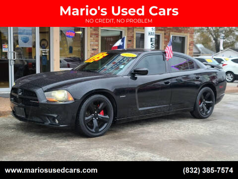 2013 Dodge Charger for sale at Mario's Used Cars - South Houston Location in South Houston TX