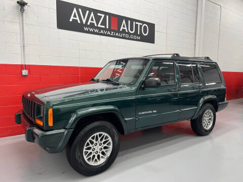 1999 Jeep Cherokee for sale at AVAZI AUTO GROUP LLC in Gaithersburg MD