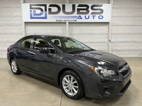 2014 Subaru Impreza for sale at DUBS AUTO LLC in Clearfield UT