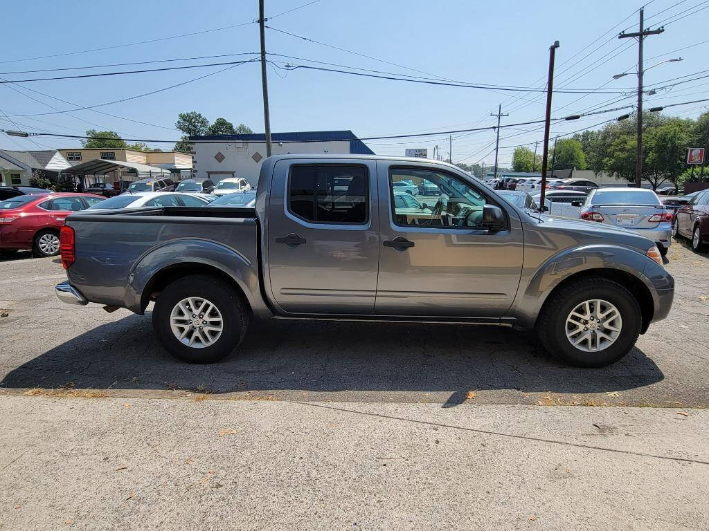 2016 Nissan Frontier for sale at DAGO'S AUTO SALES LLC in Dalton, GA