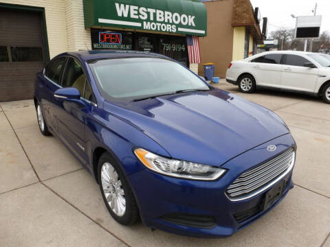 2015 Ford Fusion Hybrid for sale at Westbrook Motors in Grand Rapids MI