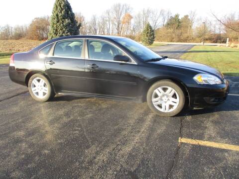 2011 Chevrolet Impala for sale at Crossroads Used Cars Inc. in Tremont IL