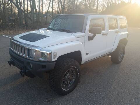 2009 HUMMER H3 for sale at Rombaugh's Auto Sales in Battle Creek MI