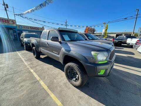 2012 Toyota Tacoma for sale at ROMO'S AUTO SALES in Los Angeles CA