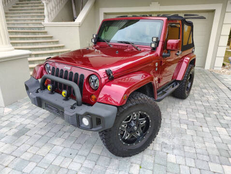 2013 Jeep Wrangler for sale at Monaco Motor Group in New Port Richey FL