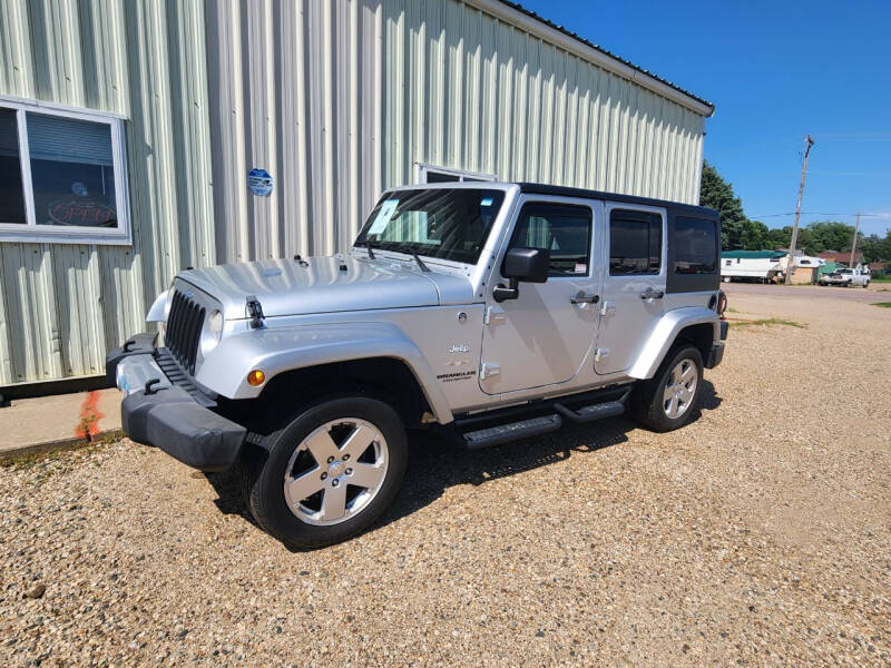 Used 2012 Jeep Wrangler Unlimited Sahara with VIN 1C4BJWEG6CL213505 for sale in Madison, SD