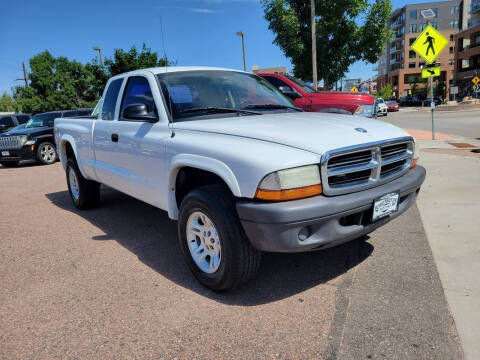 2004 Dodge Dakota for sale at BERKENKOTTER MOTORS in Brighton CO