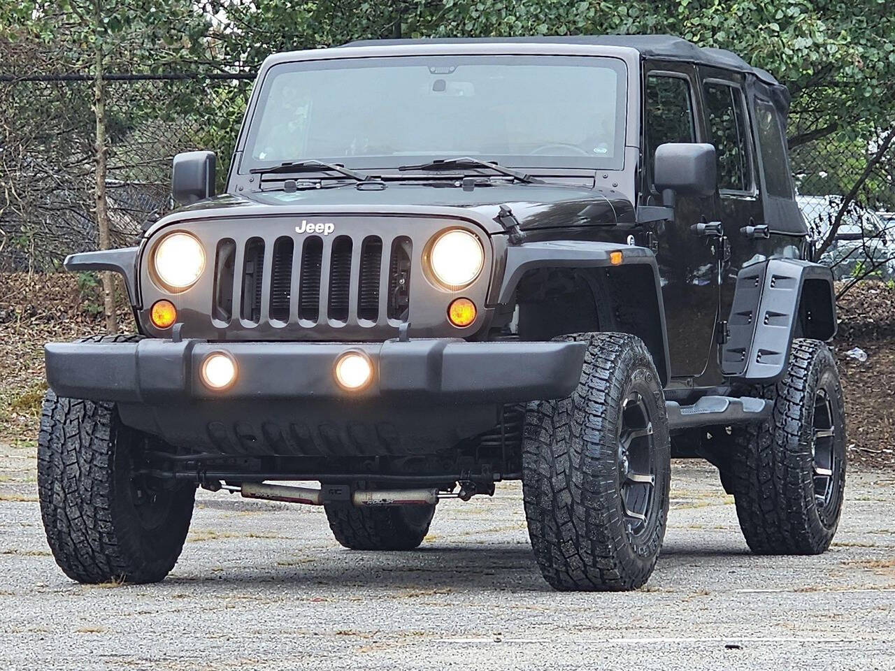 2013 Jeep Wrangler Unlimited for sale at 123 Autos in Snellville, GA