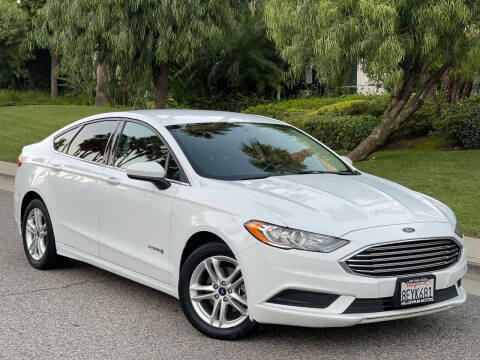 2018 Ford Fusion Hybrid for sale at MILLENNIUM MOTORS in Van Nuys CA