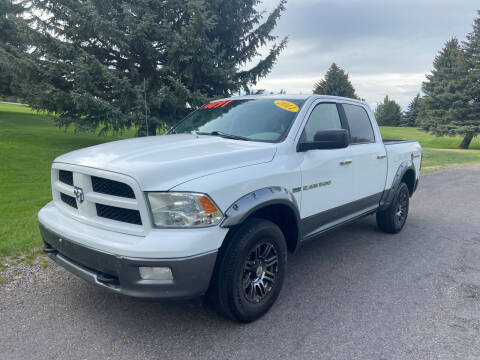 2011 RAM Ram Pickup 1500 for sale at BELOW BOOK AUTO SALES in Idaho Falls ID
