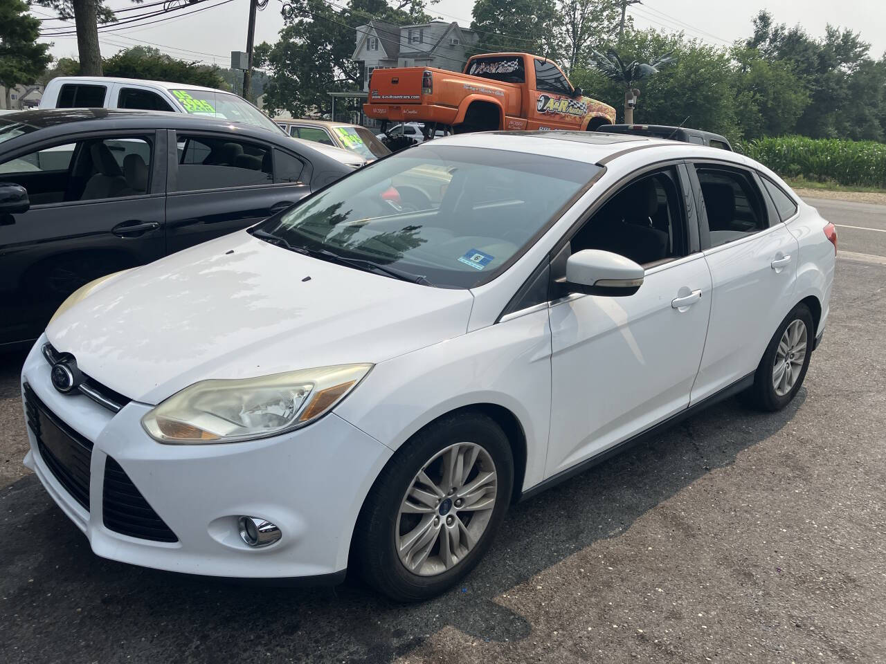 White 2012 Ford Focus Sedan Front-Wheel Drive 6-Speed Automatic