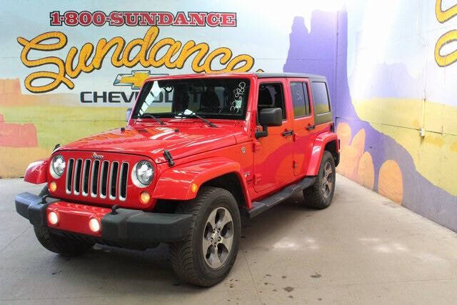 Used 2016 Jeep Wrangler Unlimited Sahara with VIN 1C4BJWEG1GL326980 for sale in Grand Ledge, MI