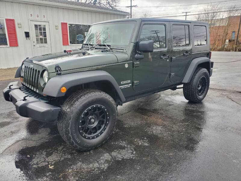 2010 Jeep Wrangler Unlimited for sale at GLASS CITY AUTO CENTER in Lancaster OH