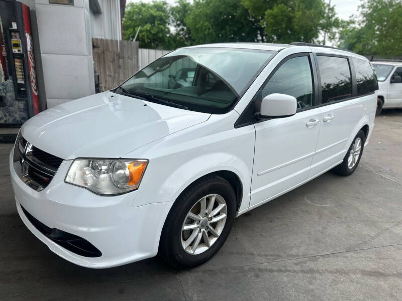 2014 Dodge Grand Caravan for sale at Buy-Fast Autos in Houston TX