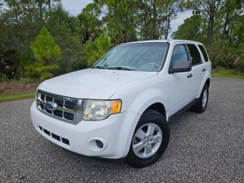 2009 Ford Escape for sale at VICTORY LANE AUTO SALES in Port Richey FL