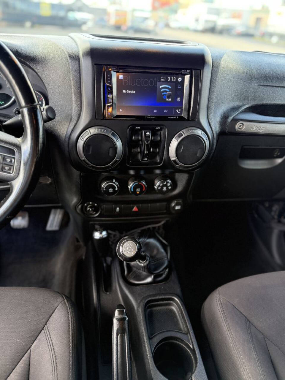 2015 Jeep Wrangler Unlimited for sale at SENNA AUTO SALES in Naples, FL