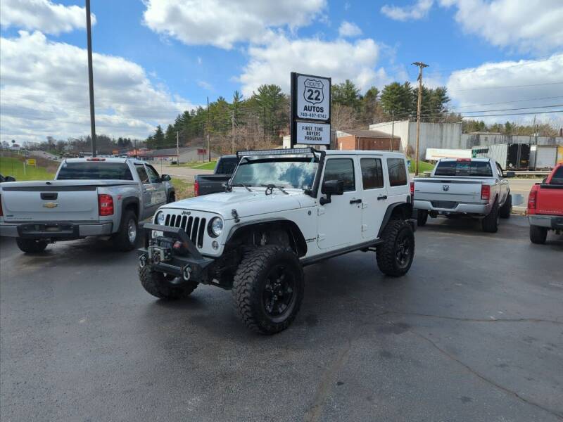 2015 Jeep Wrangler Unlimited for sale at Route 22 Autos in Zanesville OH