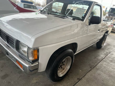 1996 Nissan Pickup for sale at Buy-Fast Autos in Houston TX